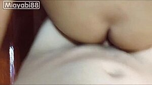 Thai brunette rides cock in doggystyle, cumming hard after intense fucking