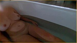 wife gets wet in hotel bath with big tits