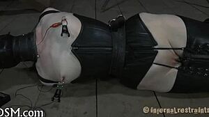 couple engages in hardcore bondage and spanking session