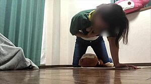 Horny amateur girl rubs her pussy on a doll imagining a man.