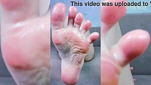 Sexy gamer licks her hairy armpits, sucks toes, plays with cum on feet, and masturbates to climax