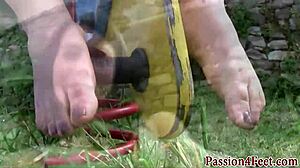 The Italian babe in heels plays with her feet outdoors.