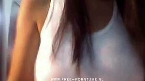 Watch cute brunette masturbating on webcam, teasing seductively.
