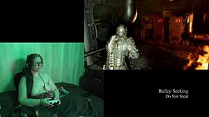 this naked brunette is playing deadspace, big tits on display