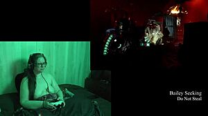 this naked brunette is playing deadspace, big tits on display