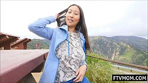 Look at this busty asian milf flashing her big tits outdoors!