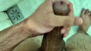 Chubby guy jerking off until he finishes in the shower with intense homemade action.