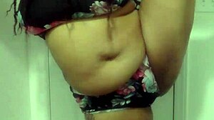 ebony milf dances with big tits in bathroom