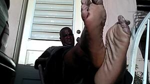 i'm a bear black master showing my big feet after work needing a slave