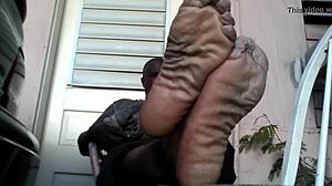 i'm a bear black master showing my big feet after work needing a slave