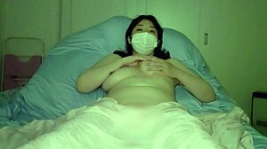 Chubby Asian Japanese Milf Masturbates Her Big Tits Before Bed In Selfie Video