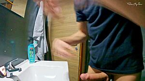 Young Petite Girl Gives Handjob in Shared Hostel Bathroom