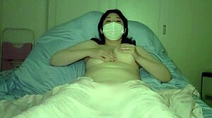 Chubby Asian Japanese Milf Masturbates Her Big Tits Before Bed In Selfie Video