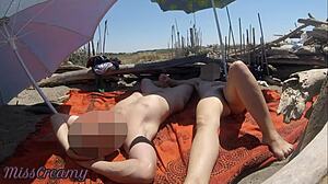 Look at me flashing my cock to strangers on this public beach!