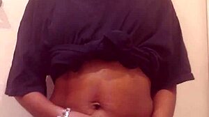 Ebony Naejae Strips And Squirts In Close Up