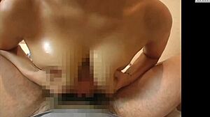 Voluptuous Asian Housewife Engages in Intense Lotion Play with Fingering and Handjob!