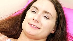 A beautiful brunette teen receives attention.