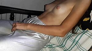 We mutually masturbate on the sofa, lesbians cumming together with small tits