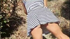 Curvy stepmom seduces stepson by removing panties and sucking cock on beach