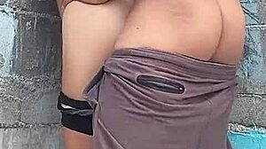 Brunette neighbor pressed against the wall