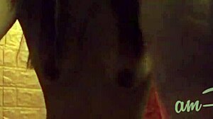 Watch this amateur chick strip, shower, dance, and touch herself?