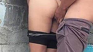 Brunette neighbor pressed against the wall