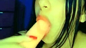 She loves sucking it just right, expressing her delight.