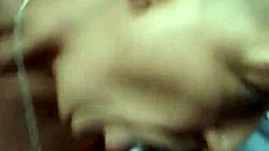 young woman specifically performs a detailed act of swallowing two large amounts of cum straight into her mouth