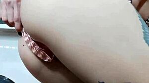 nastya fox tries a new dildo, licking and diving into her tattooed pussy