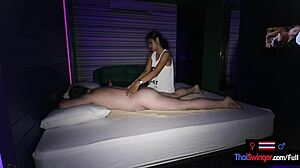 asian teen provides a relaxing massage for her customer