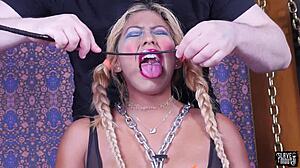 Look at this olive skinned sub teen gagging on cock, bound and submissive.