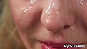 Watch this sexy model suck all the cum off her face