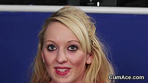 Watch this sexy model suck all the cum off her face