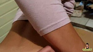 Countrygirl in Blue Leggings Feels Intense by Stove