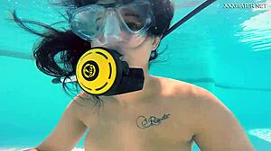 brita piskova dives deep, masturbating underwater in tight swimming pool