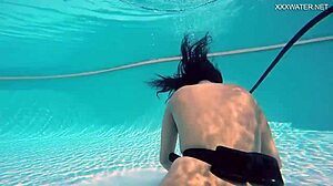 brita piskova dives deep, masturbating underwater in tight swimming pool