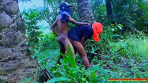 African Beauty with Big Tits Enjoys Monster Cock in Doggy Style During Christmas Festival in the Bush