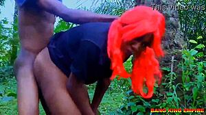 African Beauty with Big Tits Enjoys Monster Cock in Doggy Style During Christmas Festival in the Bush