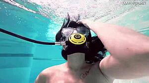 brita piskova dives deep, masturbating underwater in tight swimming pool