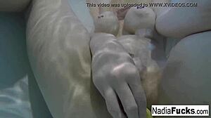 Is sexy Nadia masturbating in the bath with rubber duckies