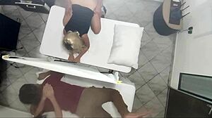 Watch the masseur fuck the woman right next to her husband