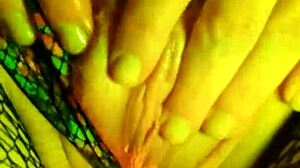 She teases the camera with pillow play.