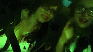 Lovely ladies pose in bikinis during a beach photoshoot, showcasing their asses and boobs outdoors.