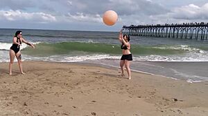 Lovely ladies pose in bikinis during a beach photoshoot, showcasing their asses and boobs outdoors.