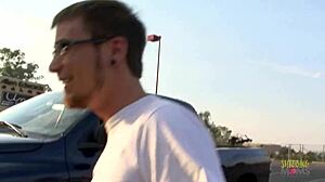 A mature woman has a sexual experience with a bearded man on the couch