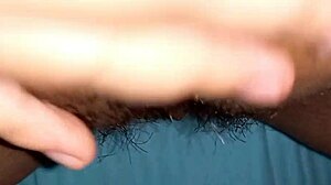 this hairy pussy has a big clit up close