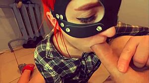 Watch this redhead take a cumshot in her throat!