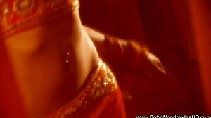 the rose of india dances naked, her clothes ripped off, laying down in erotic tease.