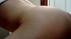 i look in the mirror while stretching my ass with toys