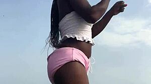 Crazybitch twerks hard in sexy clothes on the beach